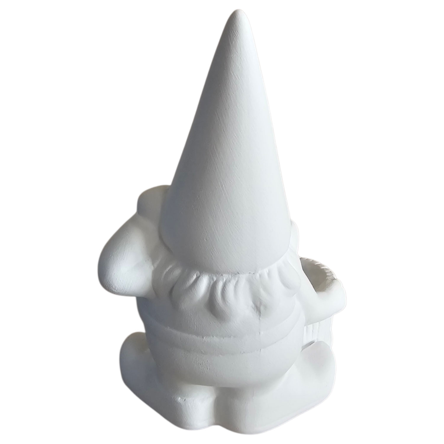 Eine weiße, unbemalte Gartenzwergfigur aus Keramik, von hinten gesehen.