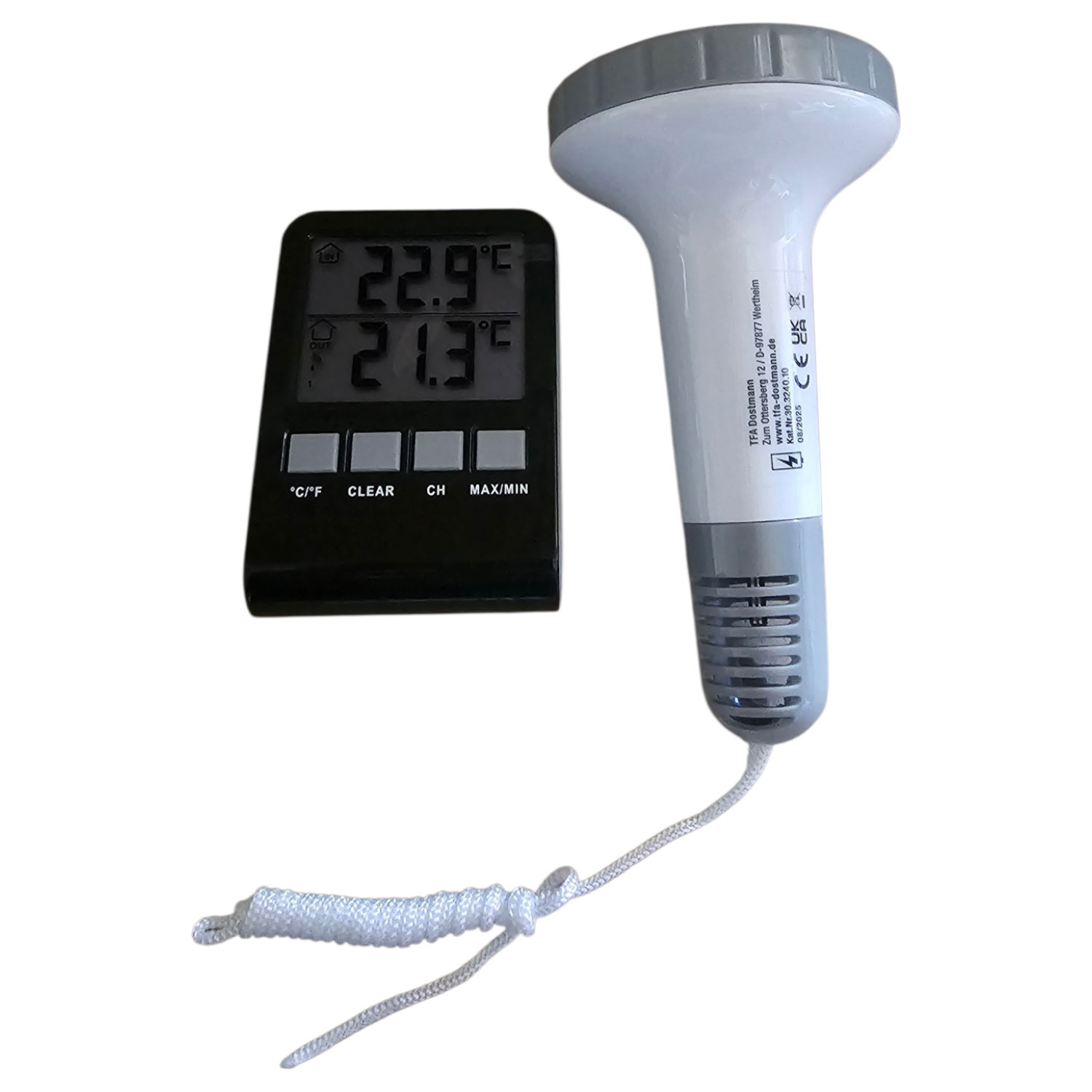 Ein digitales Thermometer mit einer schwimmenden Poolsonde und einer Basisstation.