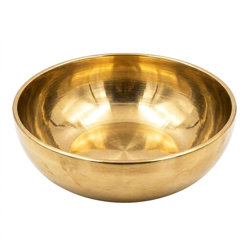 Eine polierte goldfarbene Metallklangschale mit glatter Innenfläche.