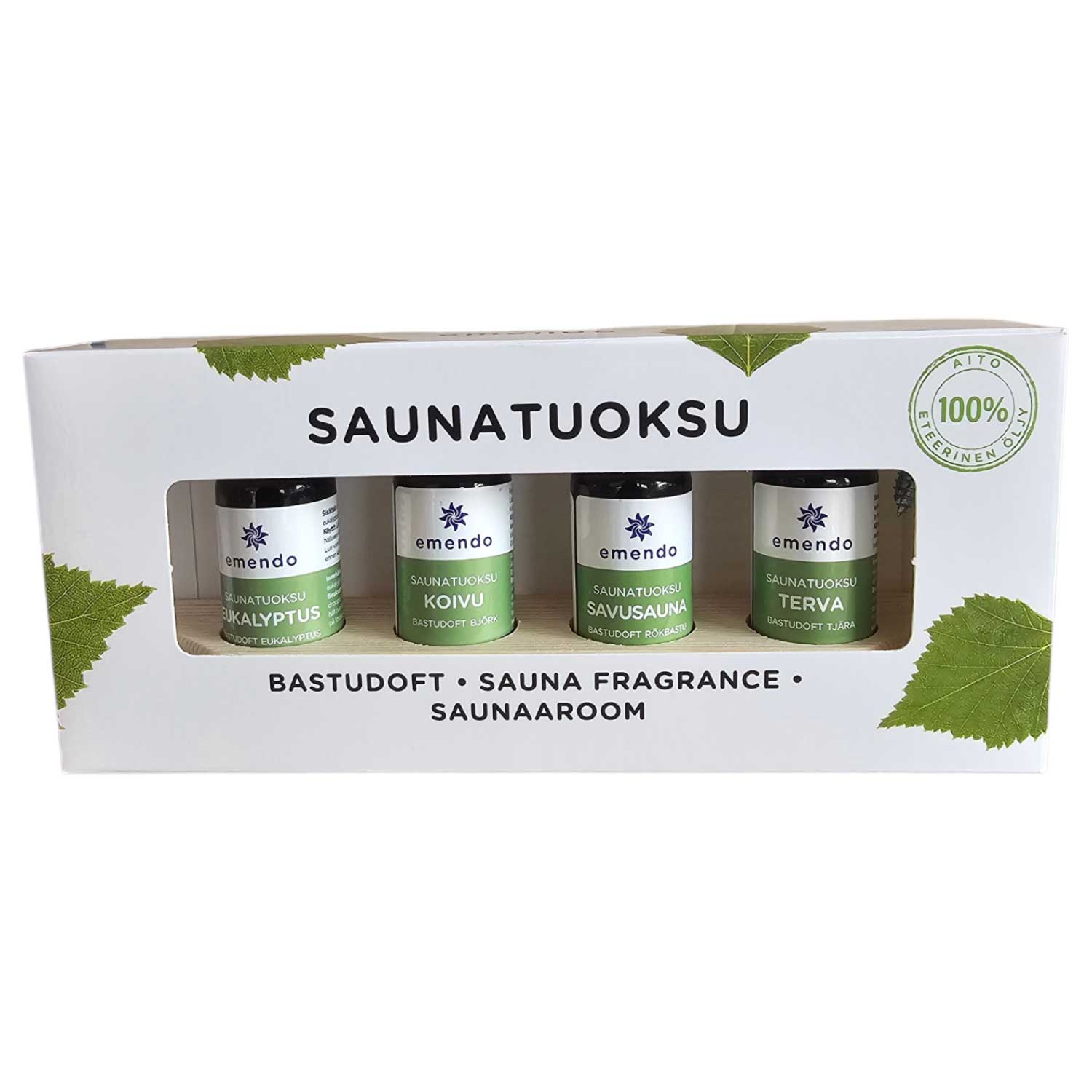 Ein Set aus vier kleinen Glasfläschchen mit Saunaduftölen in einer Pappschachtel.